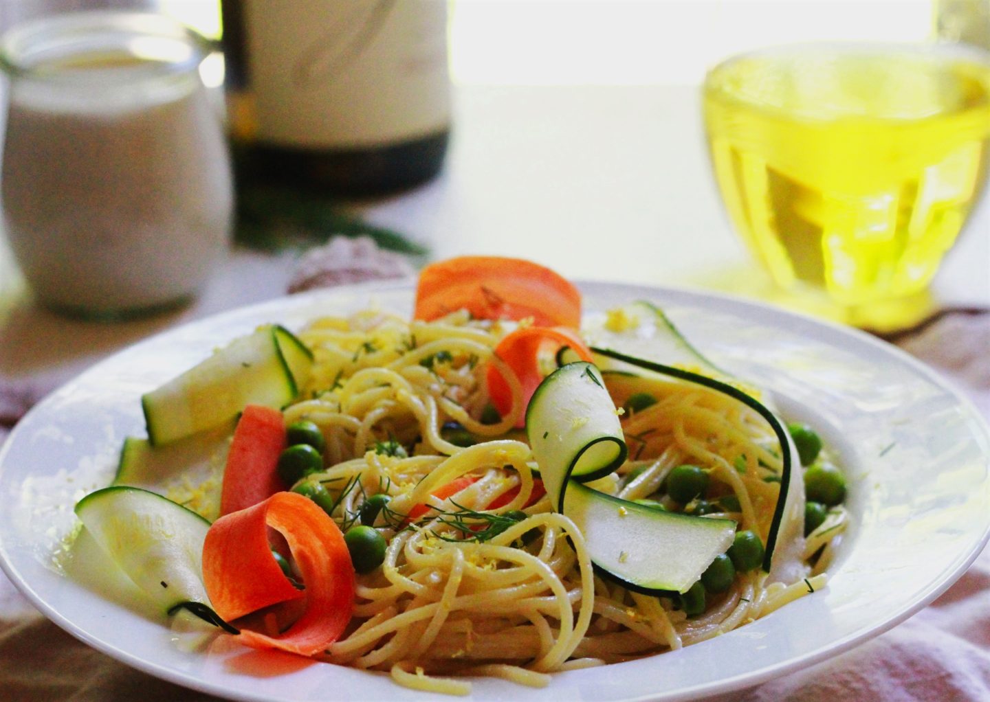 Lemon Dill Pasta with wine bottle and wine glass