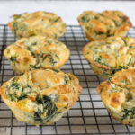 Make-Ahead Spinach Protein Muffins on a cooling rack