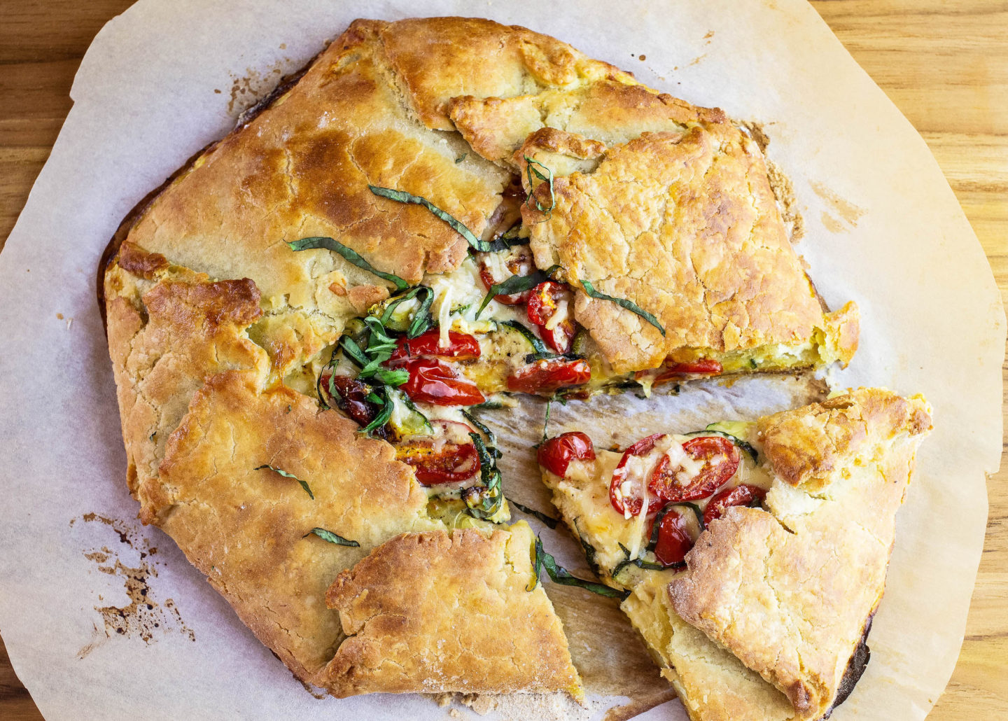 Zucchini and Tomato Galette with one slice cut