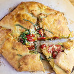 Zucchini and Tomato Galette with one slice cut