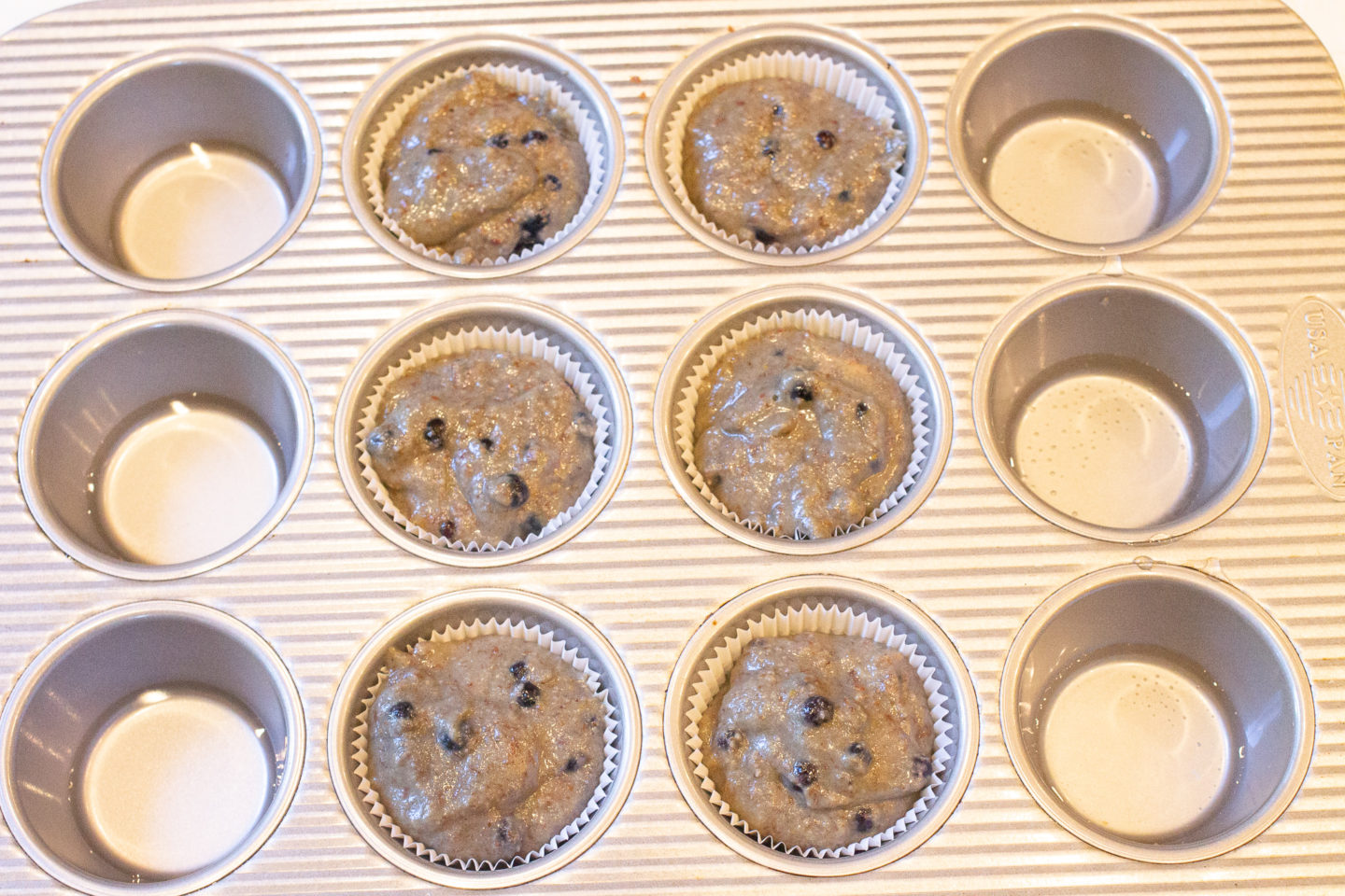Gut-Friendly Blueberry Muffins Made with Collagen Batter in muffin pan