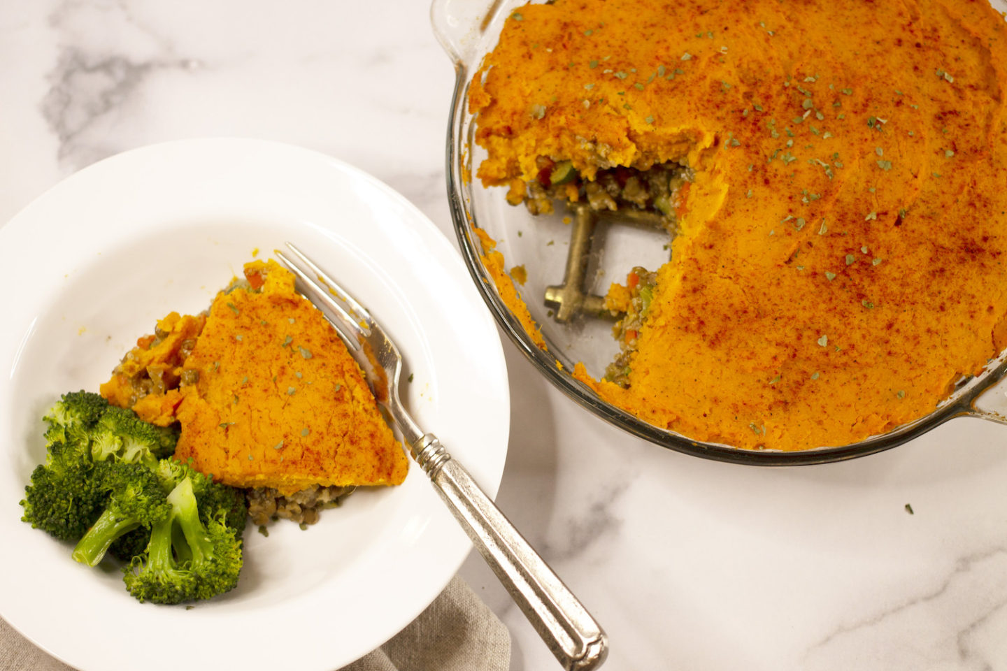 Vegan Shepherd's Pie with plate and broccoli